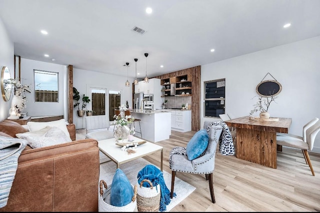 living room featuring light hardwood / wood-style flooring