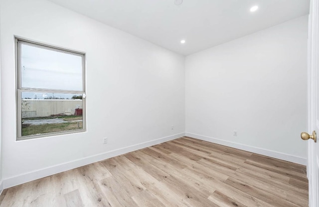 unfurnished room featuring light hardwood / wood-style flooring