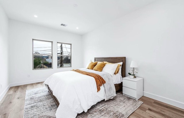 bedroom featuring wood-type flooring