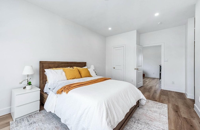 bedroom featuring light hardwood / wood-style floors