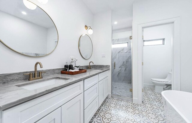 full bathroom with toilet, vanity, tile patterned floors, and shower with separate bathtub