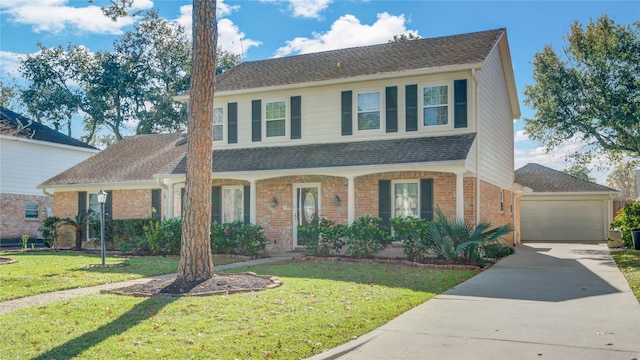 view of front of property with a garage, a front lawn, and a porch