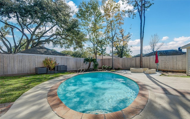 view of swimming pool featuring a patio