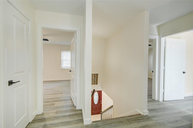 hallway featuring light wood-type flooring