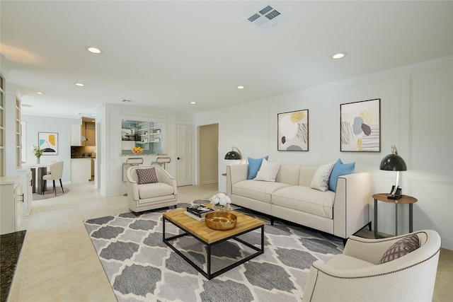 living room featuring ornamental molding