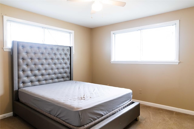 bedroom featuring ceiling fan and carpet flooring