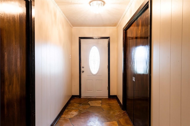 doorway to outside featuring wooden walls