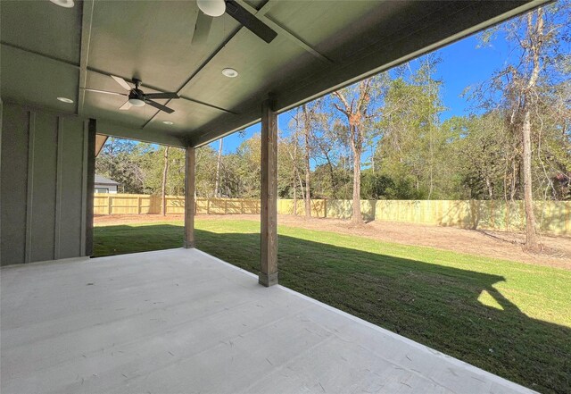 view of patio featuring ceiling fan