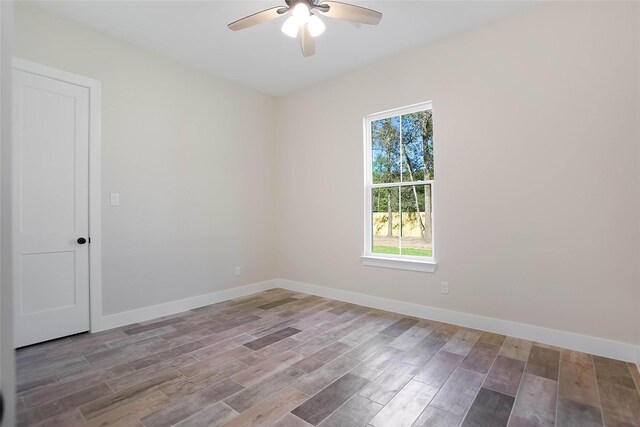 unfurnished room featuring ceiling fan and light hardwood / wood-style floors