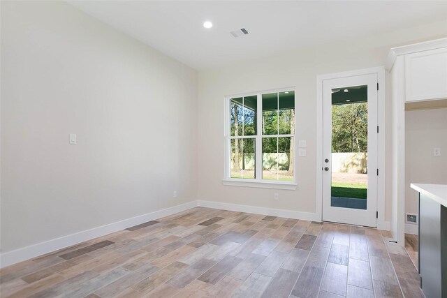 doorway featuring light hardwood / wood-style floors