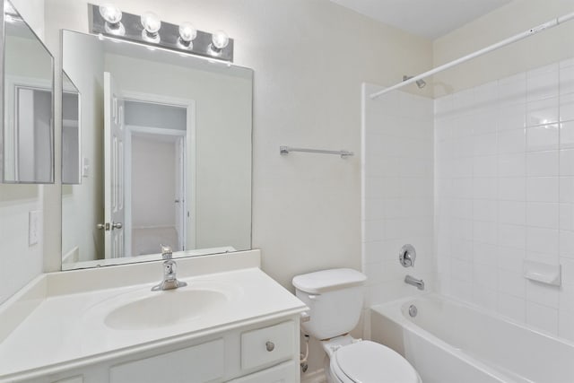 full bathroom with shower / bathing tub combination, vanity, and toilet