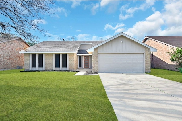 ranch-style home with a front lawn and a garage