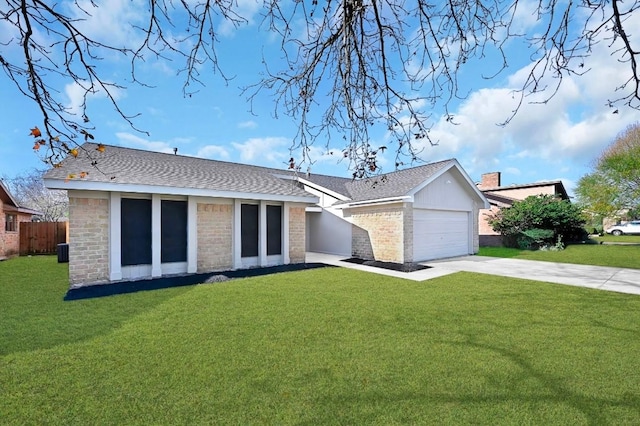 single story home featuring a front lawn, a garage, and central AC