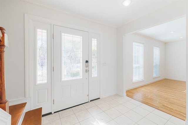 tiled entryway with crown molding