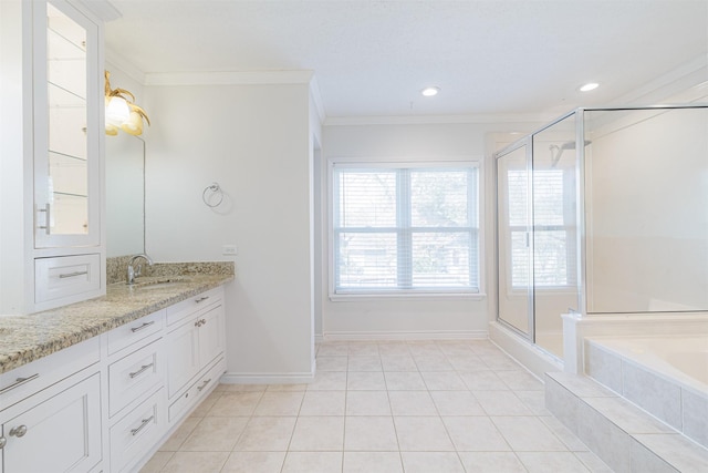 bathroom with vanity, ornamental molding, separate shower and tub, and tile patterned flooring