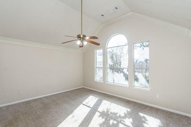 carpeted empty room with ceiling fan, ornamental molding, and lofted ceiling