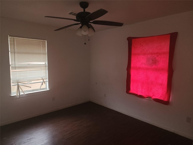 empty room with wood-type flooring and ceiling fan