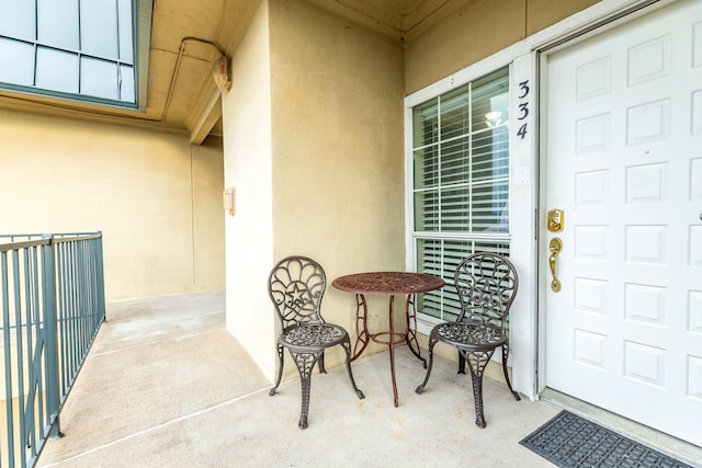 entrance to property with a balcony