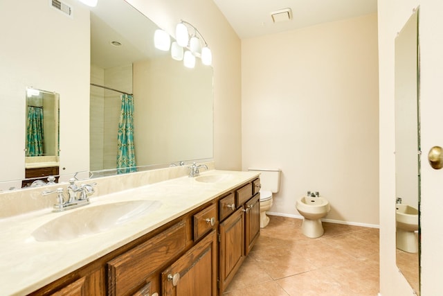 bathroom featuring toilet, a shower with shower curtain, a bidet, tile patterned flooring, and vanity