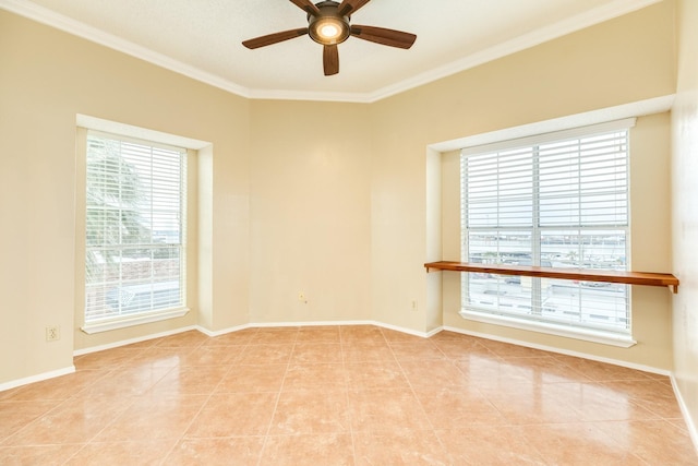 tiled empty room with ceiling fan and crown molding