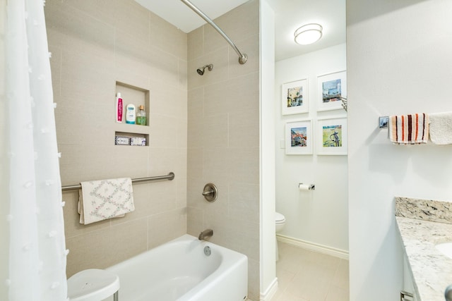 full bathroom featuring vanity, toilet, tile patterned floors, and shower / bath combo with shower curtain