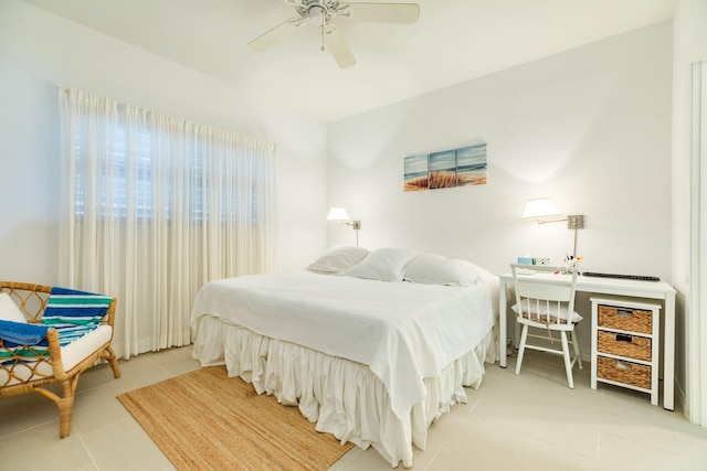 bedroom featuring ceiling fan and light tile patterned flooring