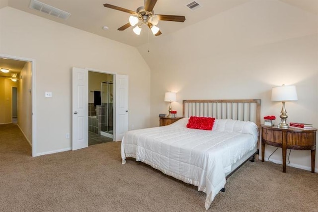 bedroom with ceiling fan, vaulted ceiling, and carpet floors