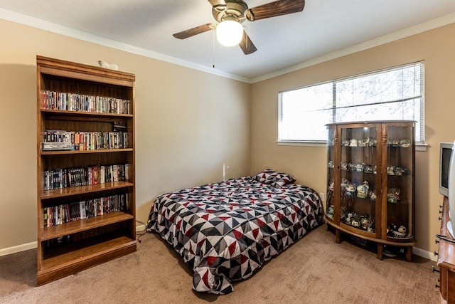 bedroom with ceiling fan, light carpet, and crown molding