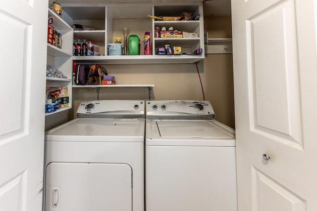 laundry area with independent washer and dryer