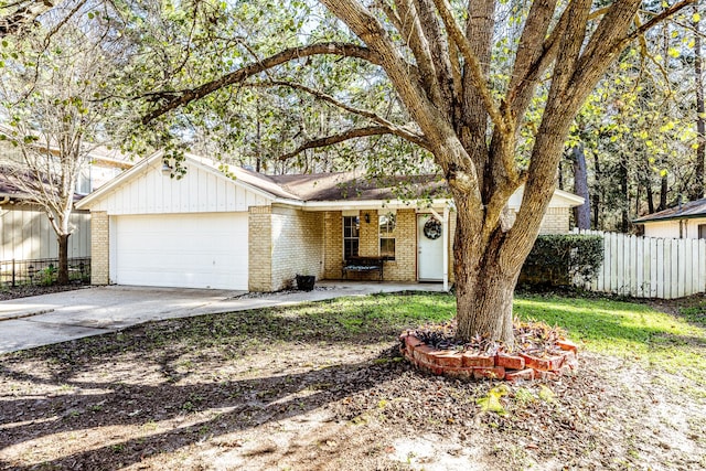 ranch-style home with a garage