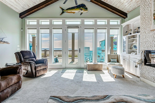 sunroom / solarium featuring wood ceiling and vaulted ceiling with beams