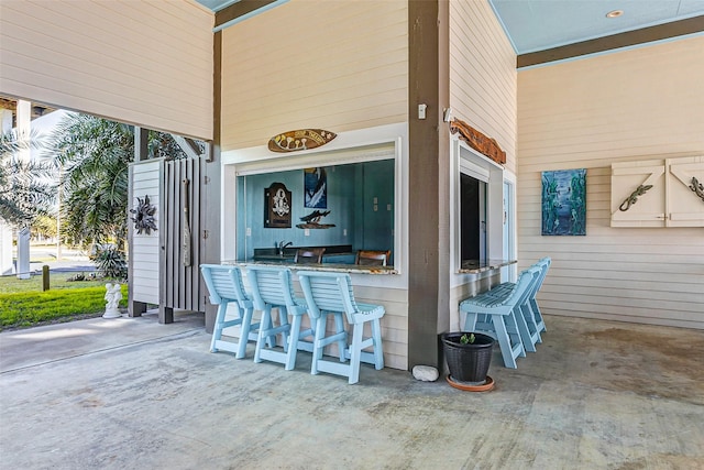 view of patio featuring a bar