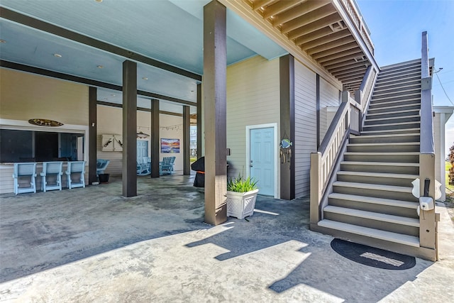 doorway to property featuring a bar