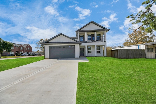 view of front of home with a front lawn, a garage, and a balcony