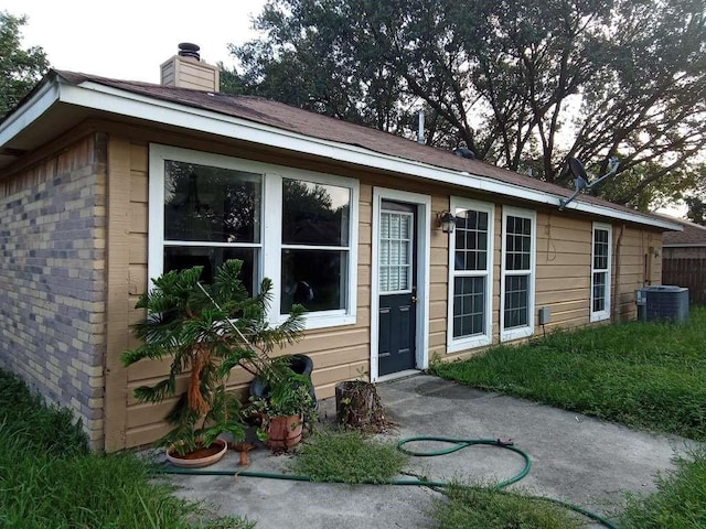 view of front of house featuring central AC unit