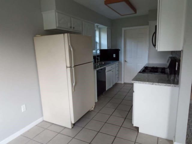 kitchen featuring dishwasher, white refrigerator, range, white cabinets, and sink