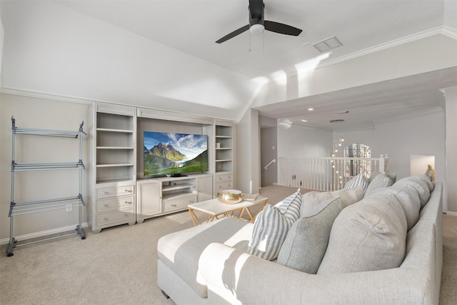 living room with light carpet, built in shelves, ceiling fan, and ornamental molding