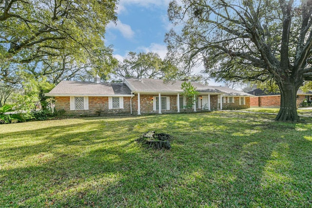 ranch-style house with a front yard