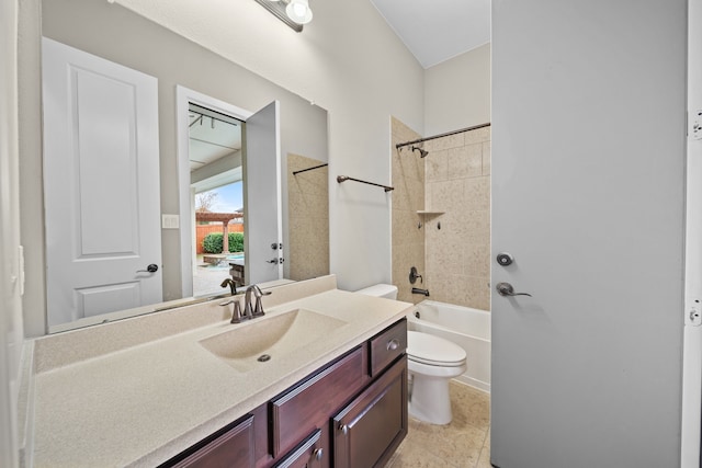 bathroom with tile patterned flooring, toilet, vanity, and bathing tub / shower combination