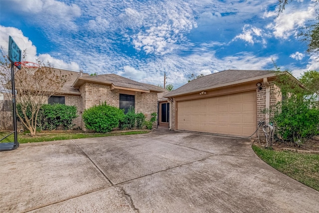 single story home featuring a garage