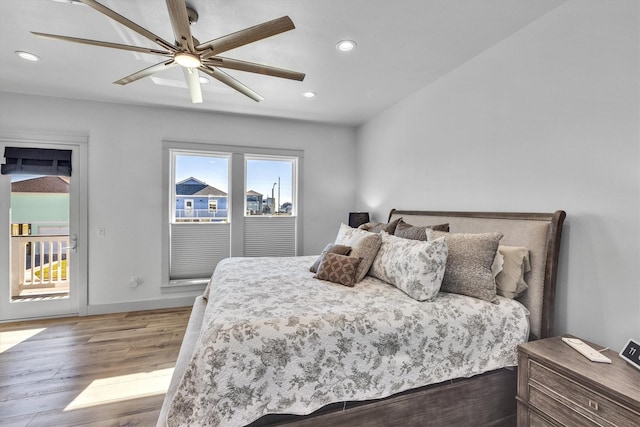 bedroom featuring baseboards, ceiling fan, wood finished floors, access to exterior, and recessed lighting