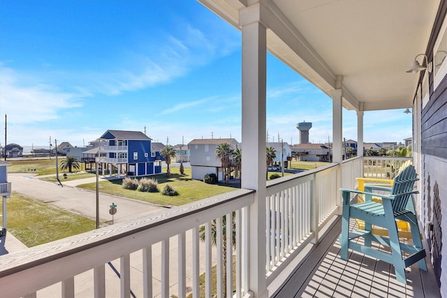 balcony featuring a residential view