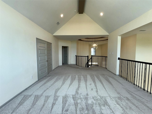 carpeted spare room with recessed lighting, a chandelier, beam ceiling, visible vents, and high vaulted ceiling