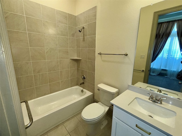 full bathroom featuring tile patterned floors, vanity, toilet, and bathing tub / shower combination