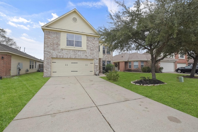 view of front facade with a front yard and a garage