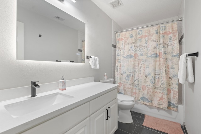 full bathroom featuring toilet, vanity, shower / bathtub combination with curtain, and tile patterned flooring