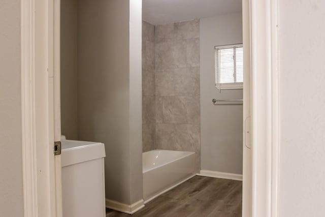 bathroom with wood-type flooring