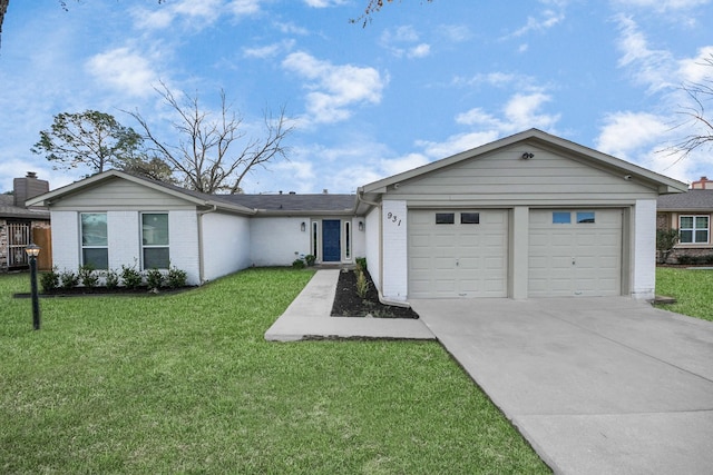 single story home featuring a front yard and a garage