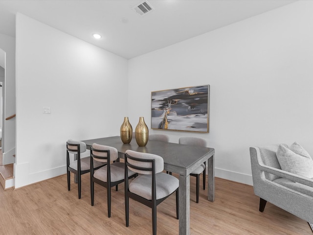 dining room with light hardwood / wood-style floors