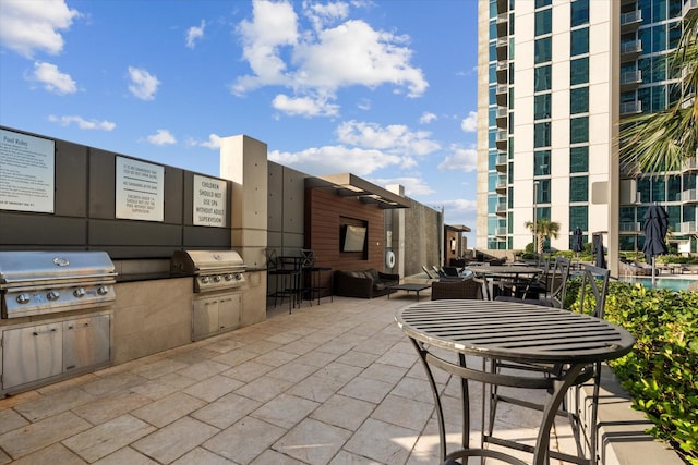 view of patio featuring grilling area and an outdoor kitchen